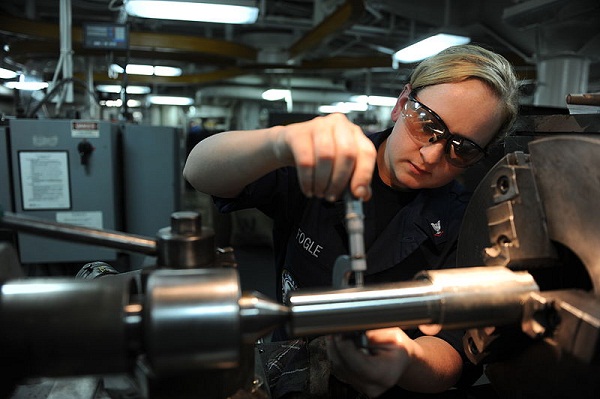  A sailor checks the outside diameter of a shear pin in the machinery repair shop aboard the Nimitz-class aircraft carrier USS John C. Stennis. 